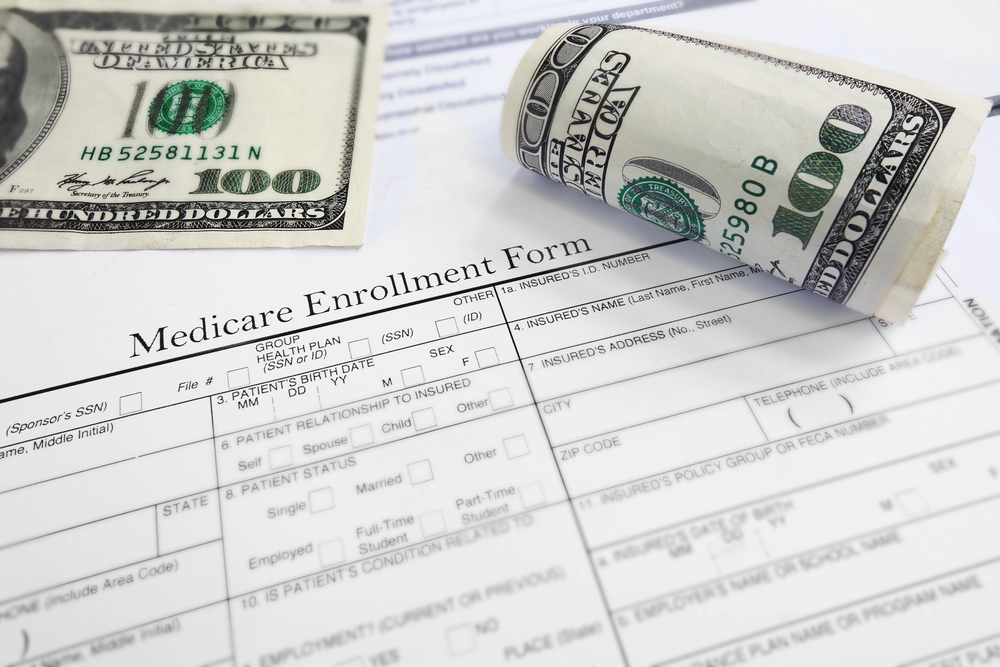 Medicare-enrollment-form-and-money